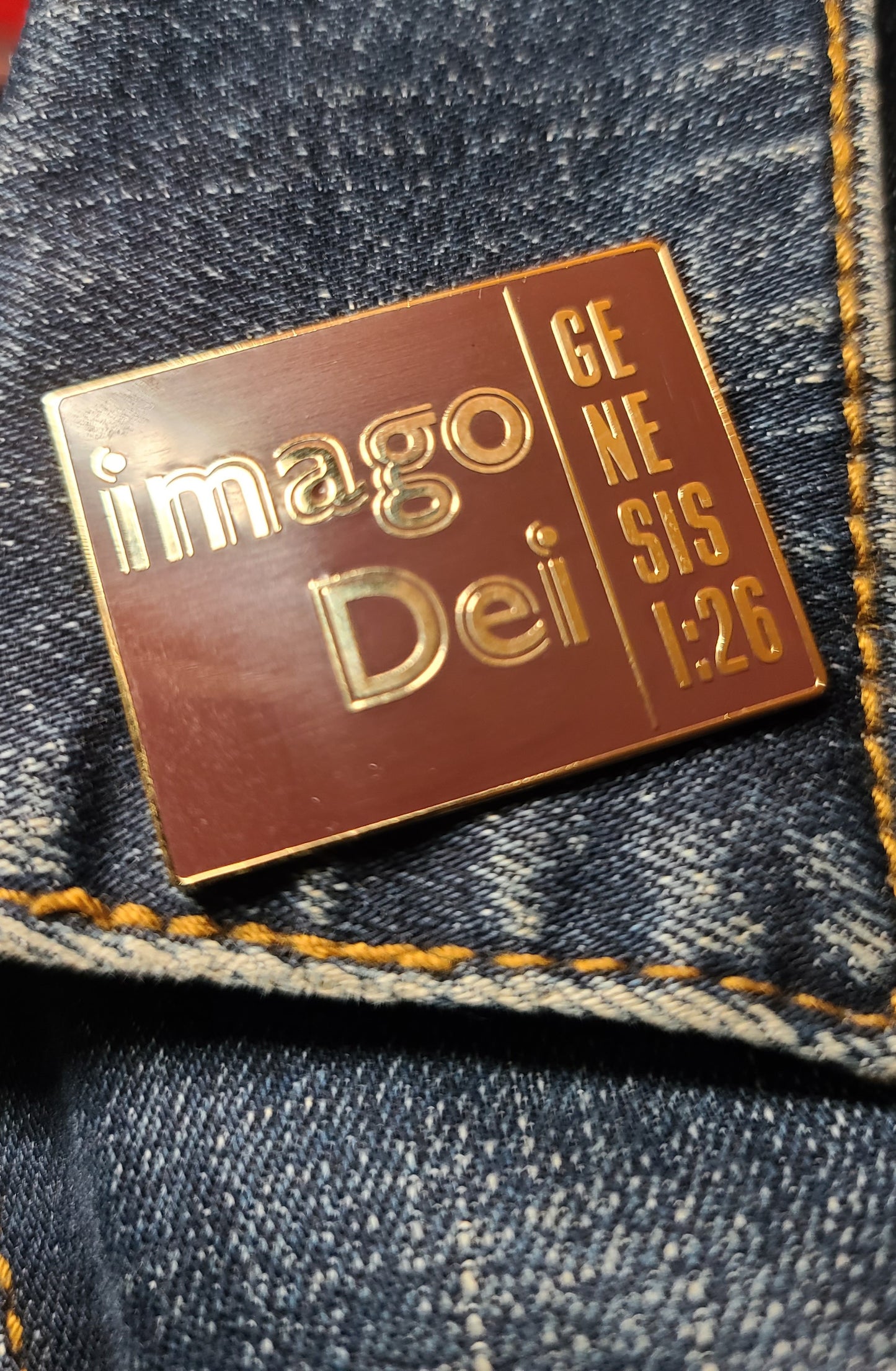 03-imago Dei. Exclusive Enamel Pin. Shiny Gold Metal – Raised Lettering.